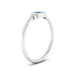 Load image into Gallery viewer, petite-bezel-set-cushion-cut-vivid-blue-engagement-ring-in-white-gold-fdenr9175cugvblueangle2-nl-wg.jpg