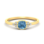 Load image into Gallery viewer, petite-bezel-set-cushion-cut-vivid-blue-engagement-ring-in-yellow-gold-fdenr9175cugvbluesleep-nl-yg.jpg