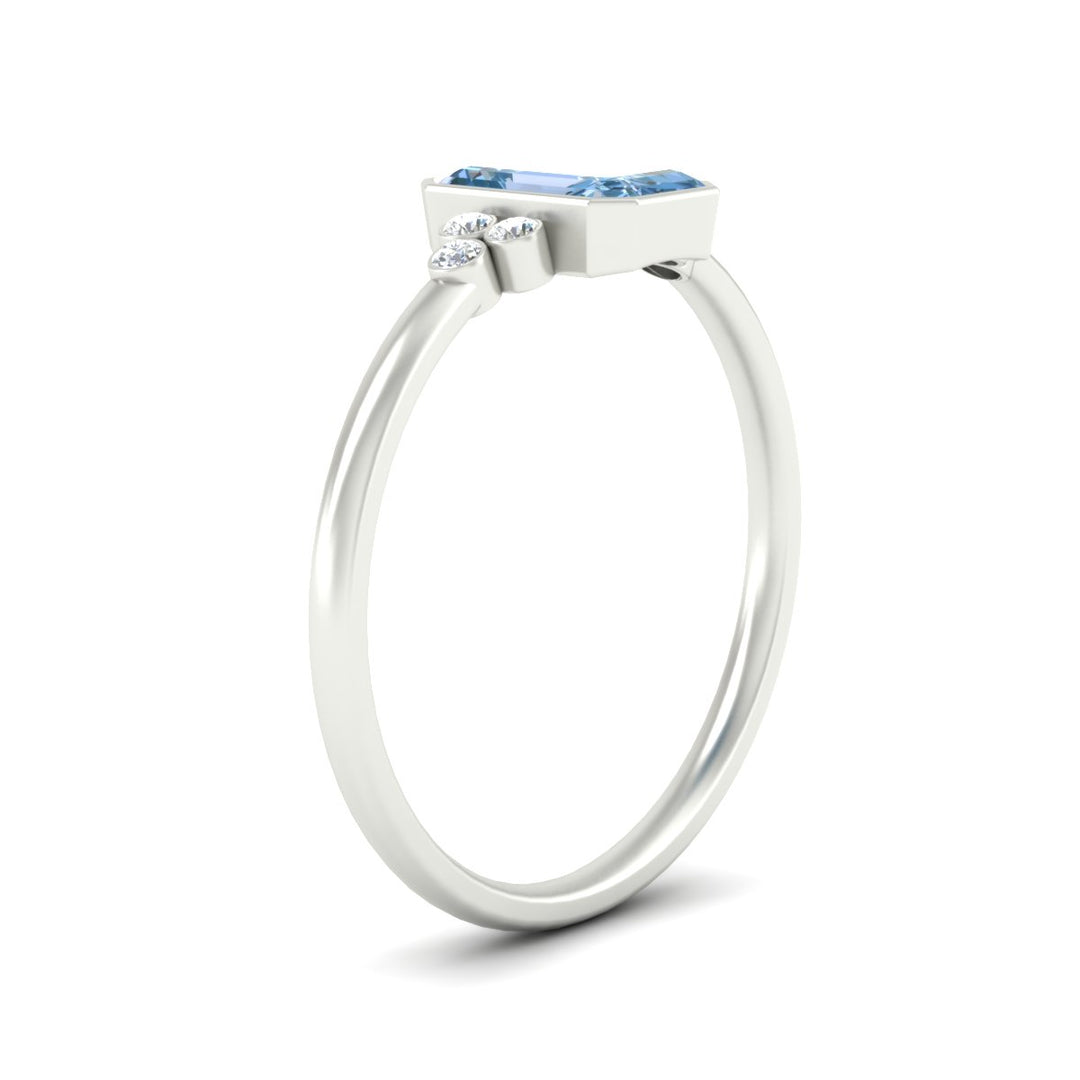 petite-bezel-set-emerald-cut-vivid-blue-engagement-ring-in-white-gold-fdenr9175emgvblueangle2-nl-wg.jpg