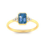 Load image into Gallery viewer, petite-bezel-set-emerald-cut-vivid-blue-engagement-ring-in-yellow-gold-fdenr9175emgvblueangle5-nl-yg.jpg