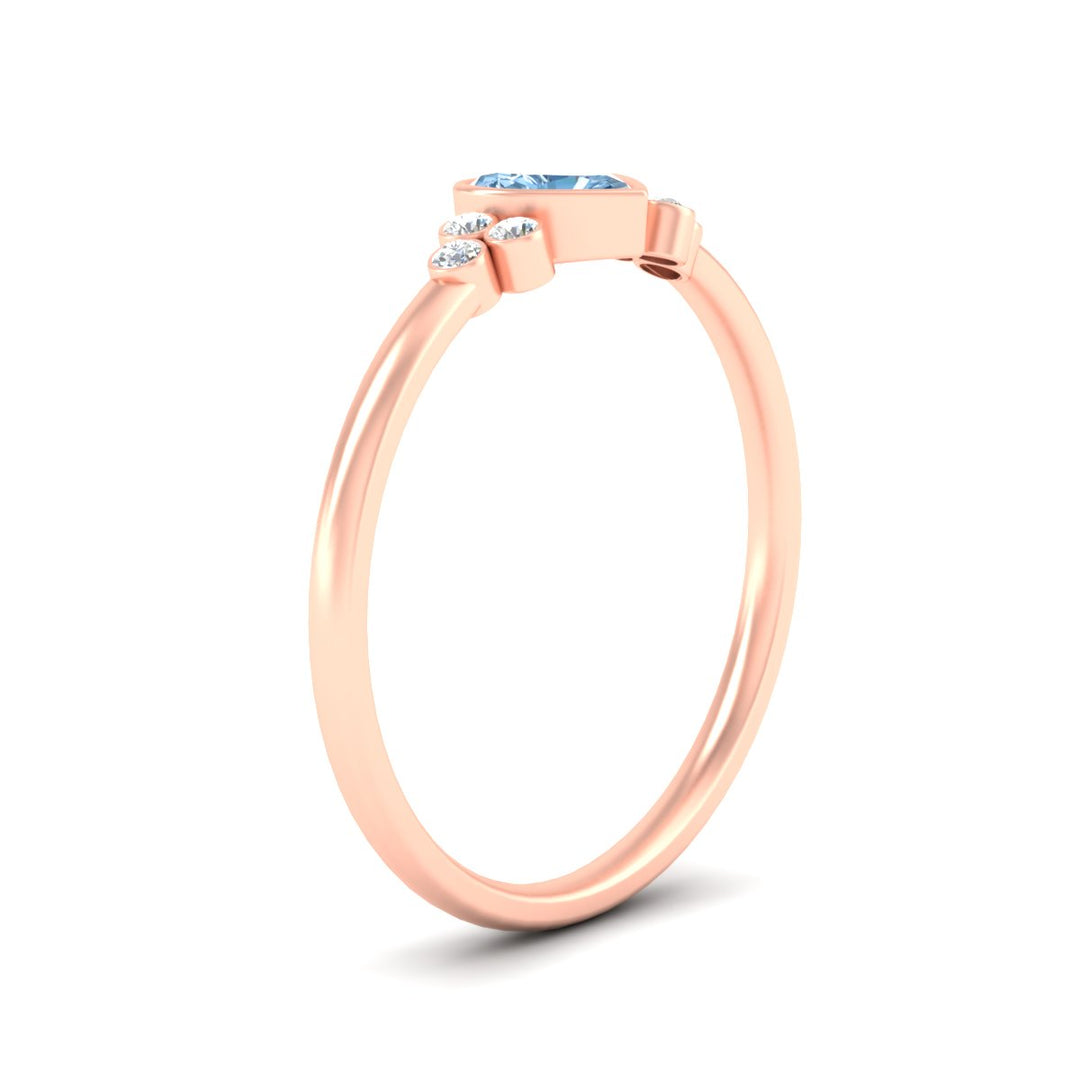 petite-bezel-set-heart-shaped-vivid-blue-engagement-ring-in-rose-gold-fdenr9175htgvblueangle2-nl-rg.jpg