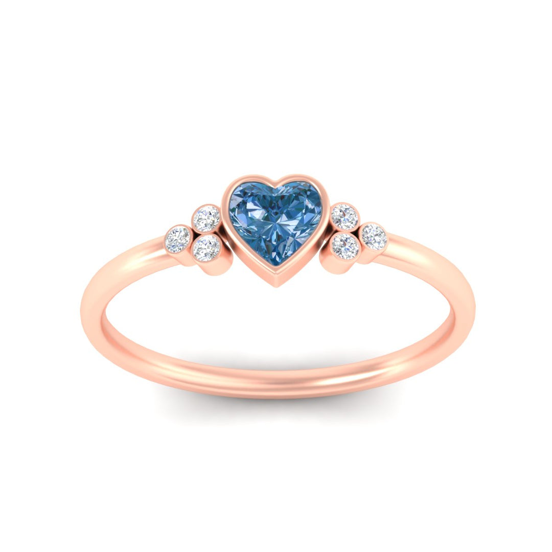 petite-bezel-set-heart-shaped-vivid-blue-engagement-ring-in-rose-gold-fdenr9175htgvblueangle5-nl-rg.jpg