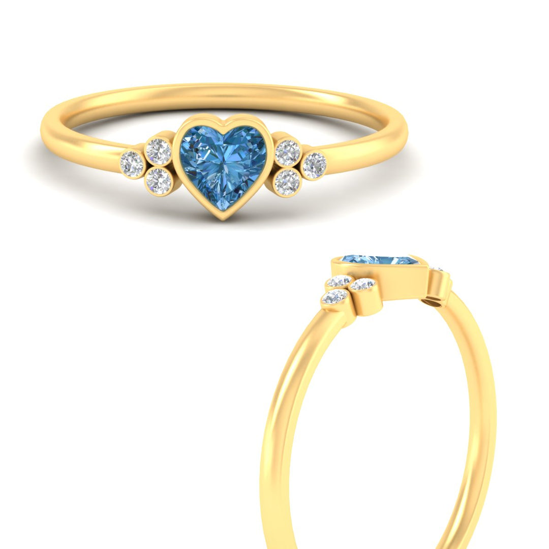 petite-bezel-set-heart-shaped-vivid-blue-engagement-ring-in-yellow-gold-fdenr9175htgvblueangle3-nl-yg.jpg