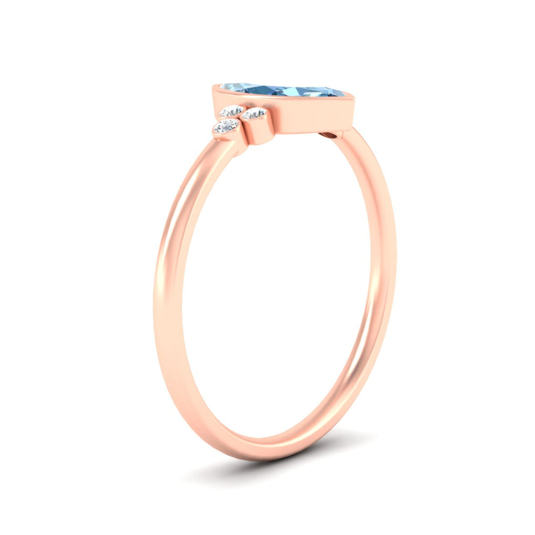 petite-bezel-set-marquise-cut-vivid-blue-engagement-ring-in-rose-gold-fdenr9175mqgvblueangle2-nl-rg.jpg