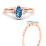 Load image into Gallery viewer, petite-bezel-set-marquise-cut-vivid-blue-engagement-ring-in-rose-gold-fdenr9175mqgvblueangle3-nl-rg.jpg