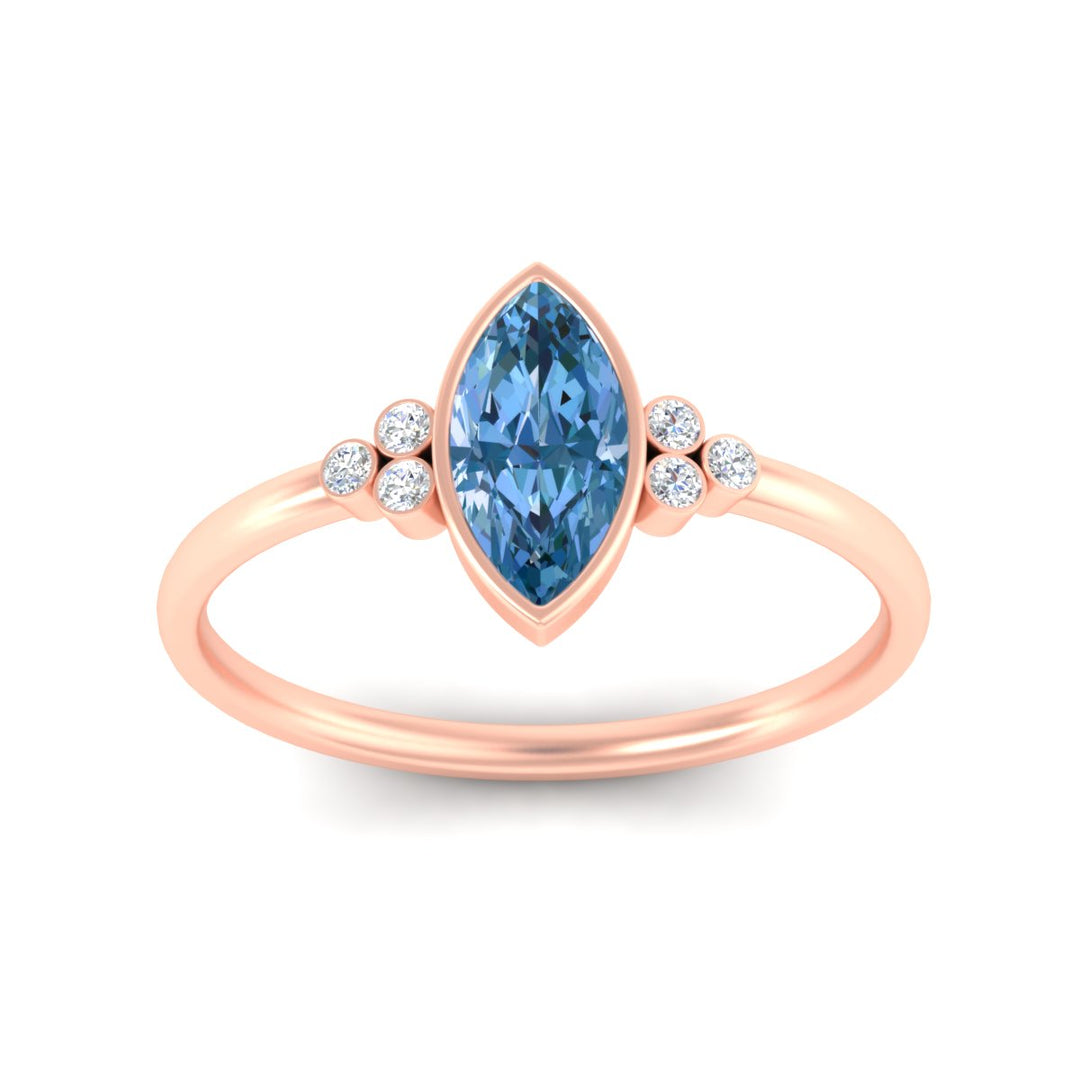 petite-bezel-set-marquise-cut-vivid-blue-engagement-ring-in-rose-gold-fdenr9175mqgvblueangle5-nl-rg.jpg