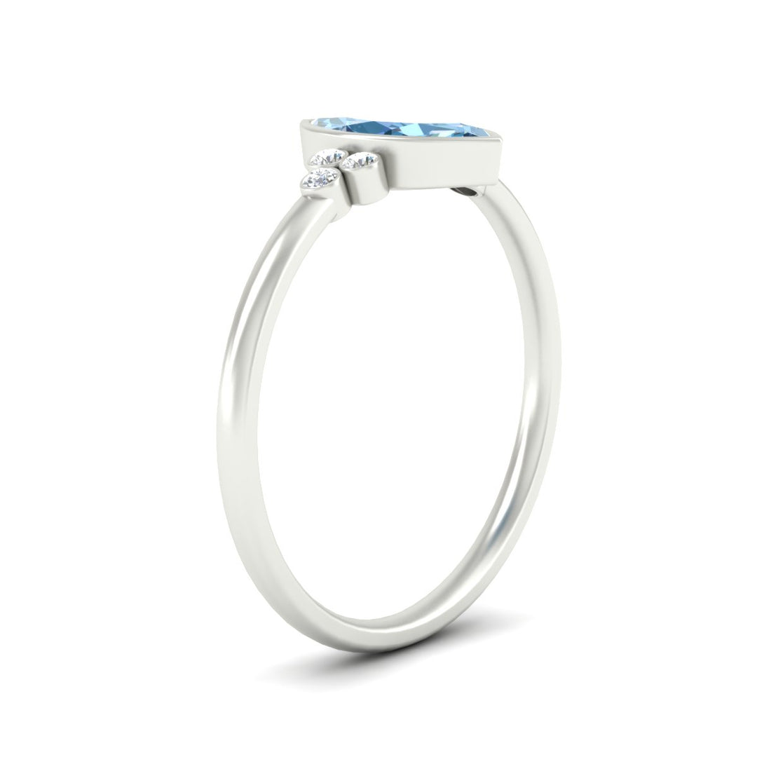 petite-bezel-set-marquise-cut-vivid-blue-engagement-ring-in-white-gold-fdenr9175mqgvblueangle2-nl-wg.jpg