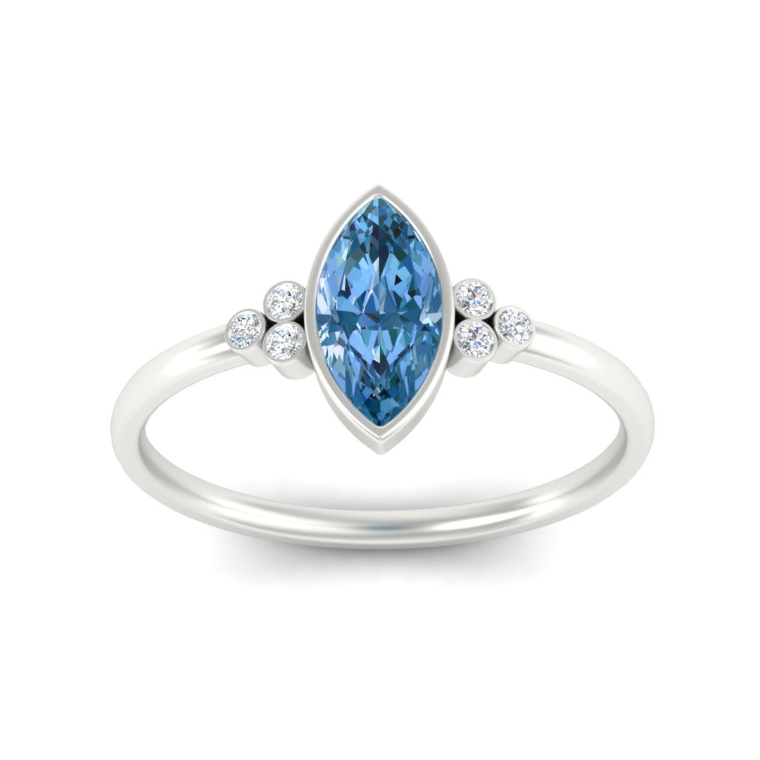 petite-bezel-set-marquise-cut-vivid-blue-engagement-ring-in-white-gold-fdenr9175mqgvblueangle5-nl-wg.jpg