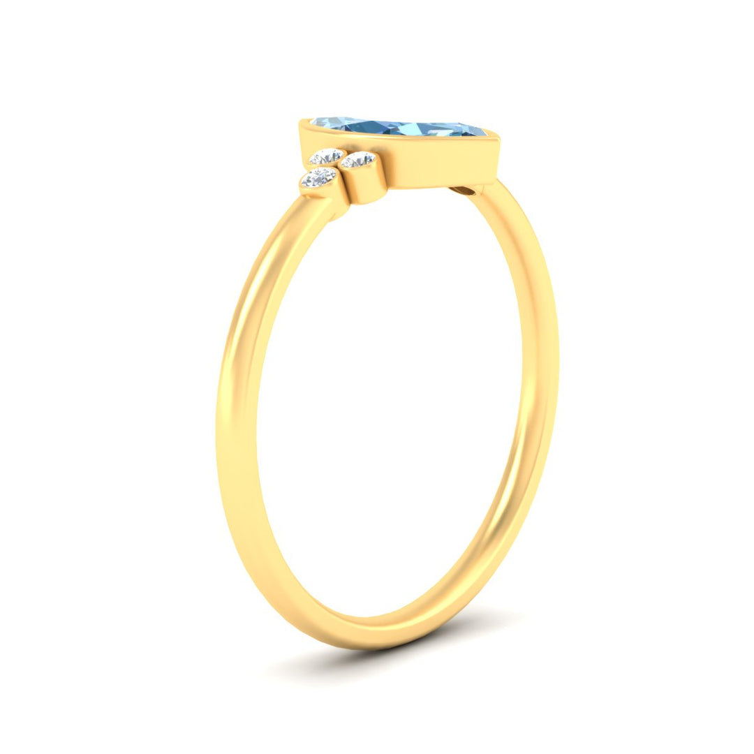 petite-bezel-set-marquise-cut-vivid-blue-engagement-ring-in-yellow-gold-fdenr9175mqgvblueangle2-nl-yg.jpg