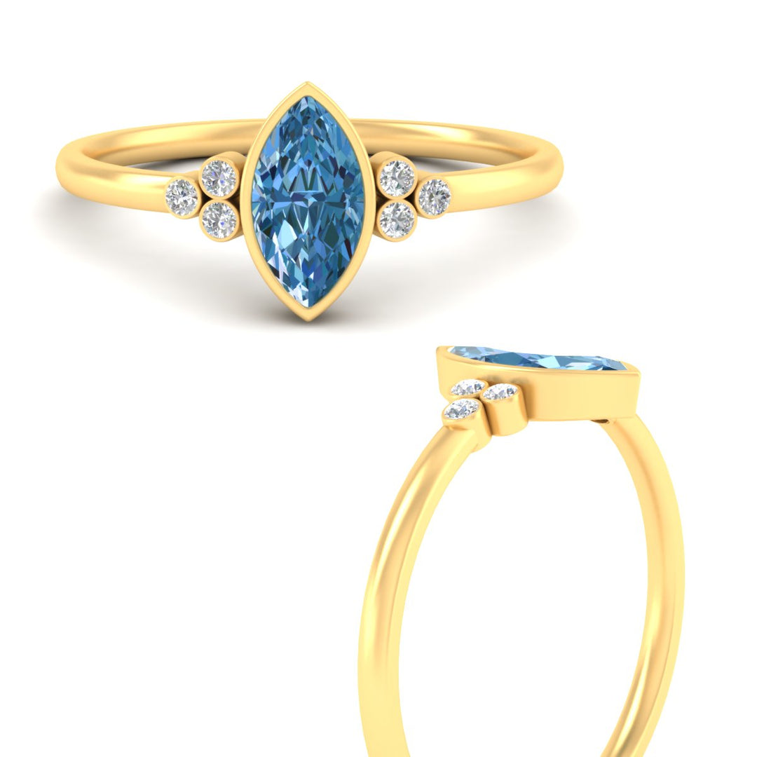 petite-bezel-set-marquise-cut-vivid-blue-engagement-ring-in-yellow-gold-fdenr9175mqgvblueangle3-nl-yg.jpg