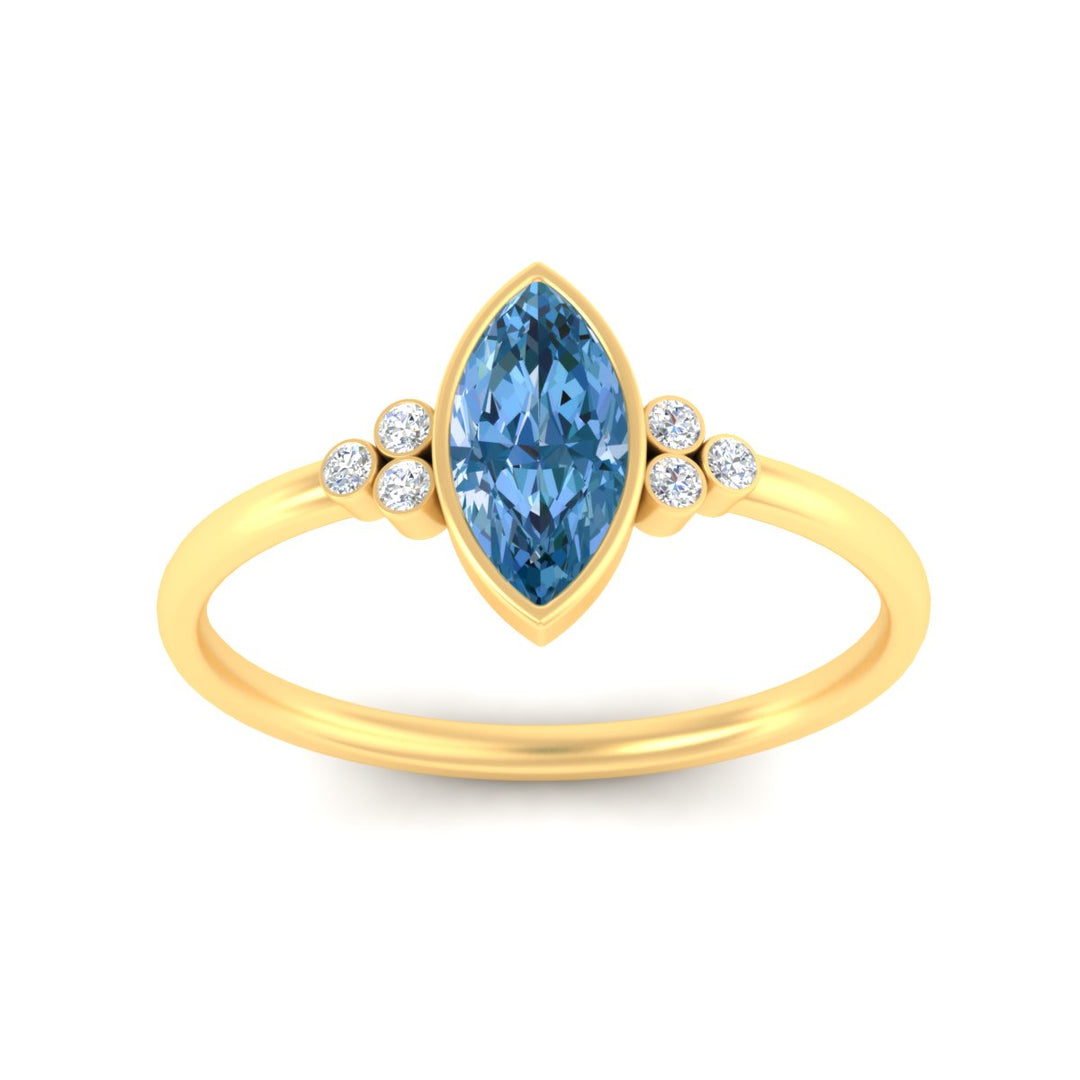 petite-bezel-set-marquise-cut-vivid-blue-engagement-ring-in-yellow-gold-fdenr9175mqgvblueangle5-nl-yg.jpg