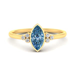 Load image into Gallery viewer, petite-bezel-set-marquise-cut-vivid-blue-engagement-ring-in-yellow-gold-fdenr9175mqgvbluesleep-nl-yg.jpg