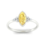 Load image into Gallery viewer, petite-bezel-set-marquise-cut-vivid-yellow-engagement-ring-in-white-gold-fdenr9175mqgvyellowangle5-nl-wg.jpg