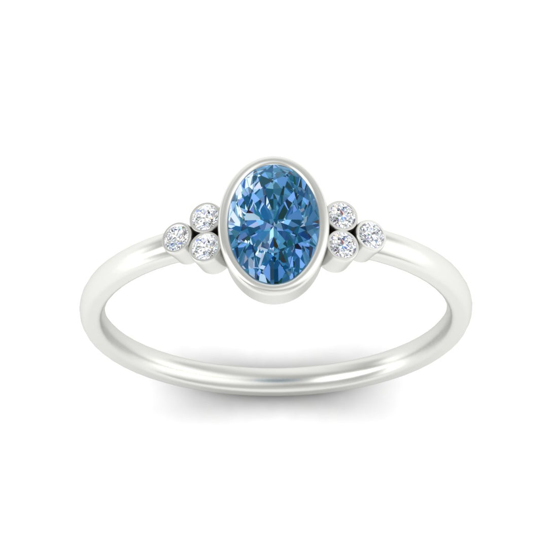 petite-bezel-set-oval-shaped-vivid-blue-engagement-ring-in-white-gold-fdenr9175ovgvblueangle5-nl-wg.jpg
