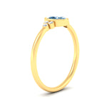 Load image into Gallery viewer, petite-bezel-set-oval-shaped-vivid-blue-engagement-ring-in-yellow-gold-fdenr9175ovgvblueangle2-nl-yg.jpg