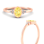 Load image into Gallery viewer, petite-bezel-set-oval-shaped-vivid-yellow-engagement-ring-in-rose-gold-fdenr9175ovgvyellowangle3-nl-rg.jpg