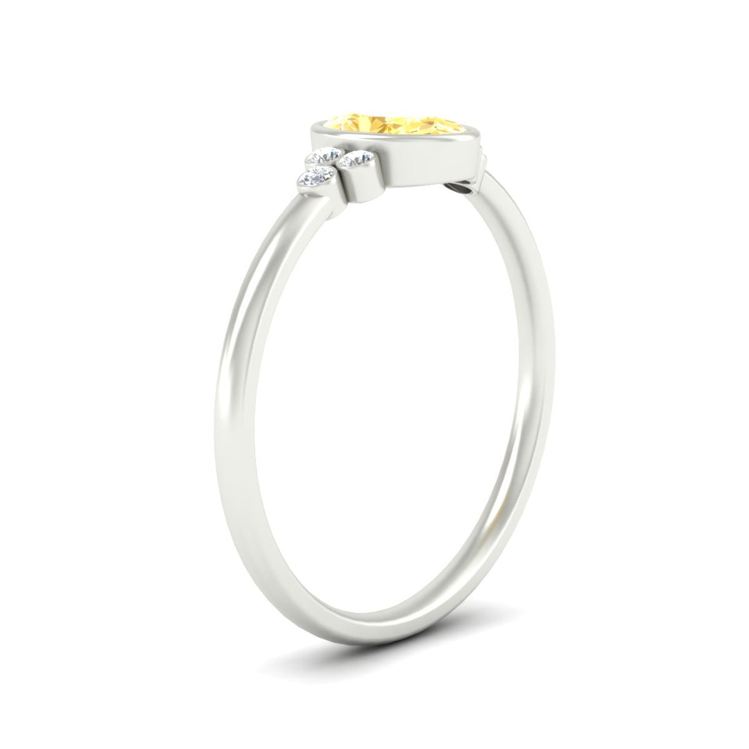 petite-bezel-set-oval-shaped-vivid-yellow-engagement-ring-in-white-gold-fdenr9175ovgvyellowangle2-nl-wg.jpg
