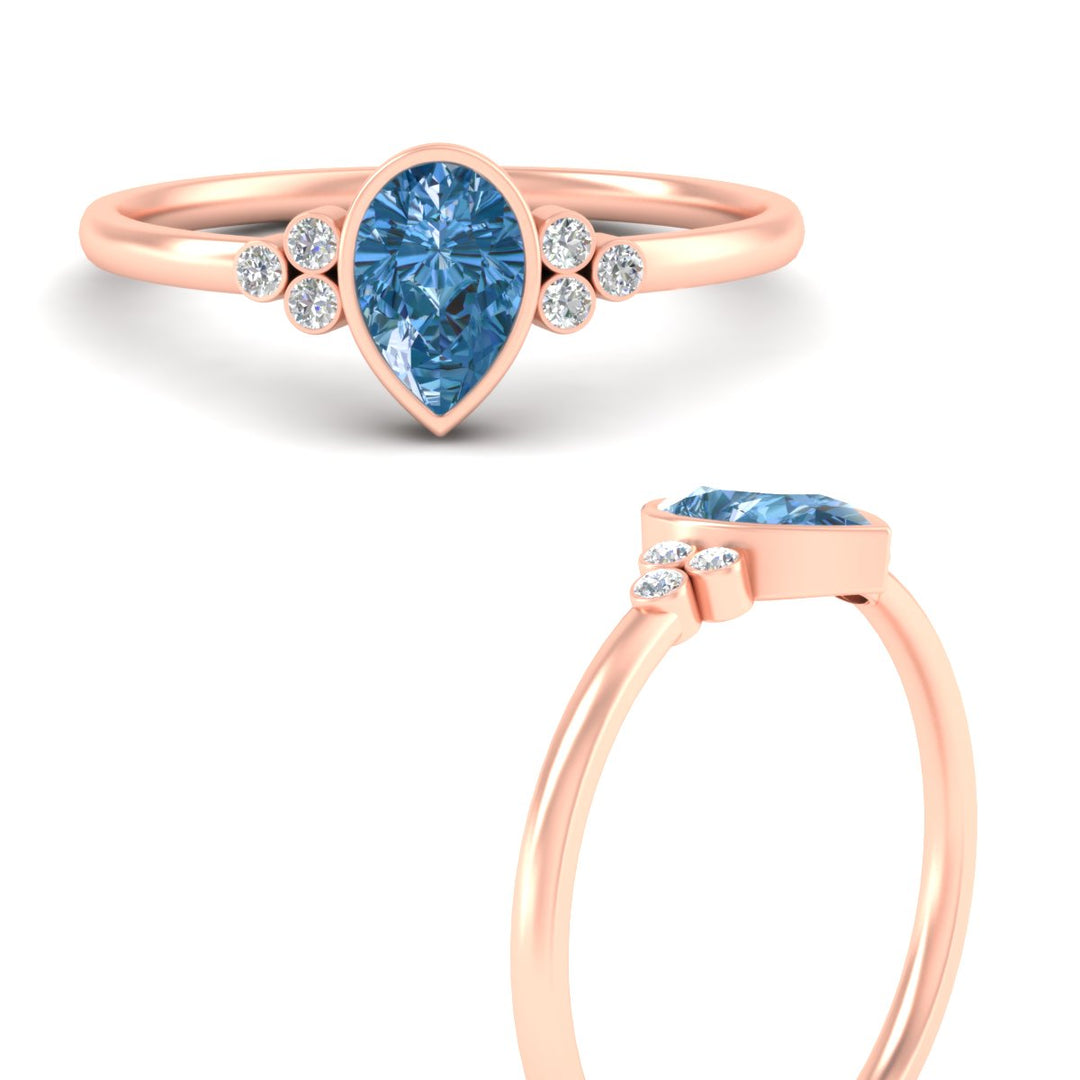 petite-bezel-set-pear-shaped-vivid-blue-engagement-ring-in-rose-gold-fdenr9175pegvblueangle3-nl-rg.jpg