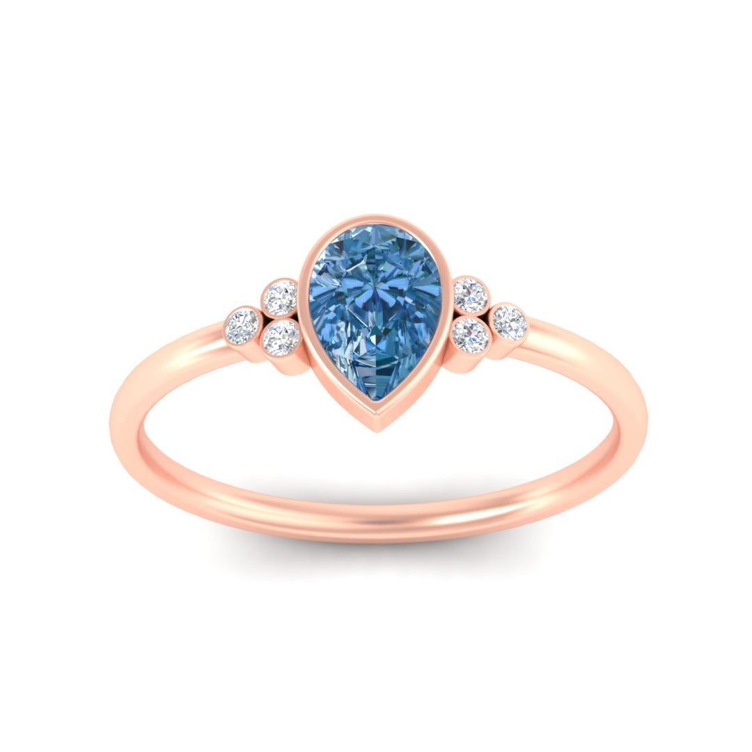 petite-bezel-set-pear-shaped-vivid-blue-engagement-ring-in-rose-gold-fdenr9175pegvblueangle5-nl-rg.jpg