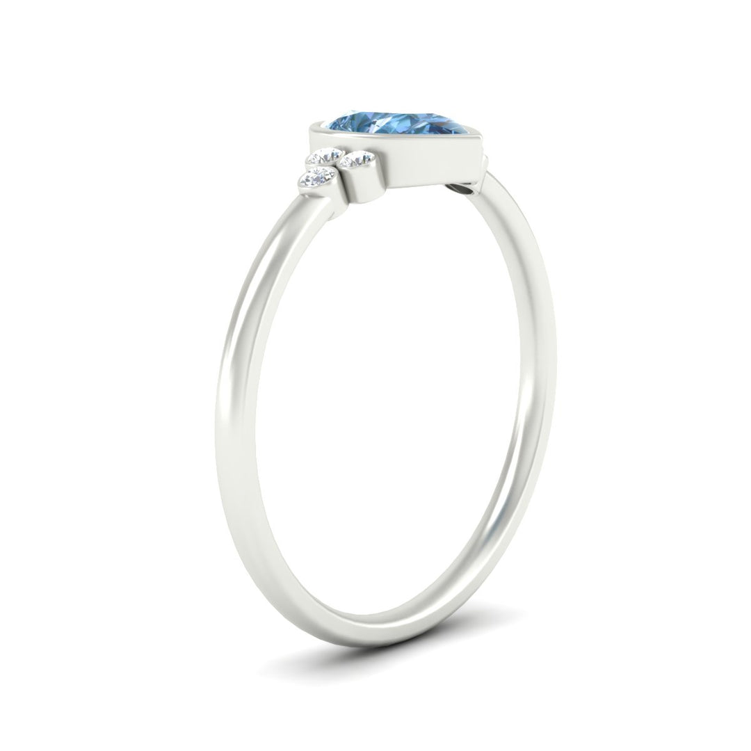 petite-bezel-set-pear-shaped-vivid-blue-engagement-ring-in-white-gold-fdenr9175pegvblueangle2-nl-wg.jpg