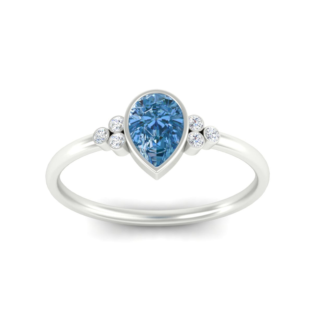petite-bezel-set-pear-shaped-vivid-blue-engagement-ring-in-white-gold-fdenr9175pegvblueangle5-nl-wg.jpg