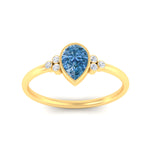 Load image into Gallery viewer, petite-bezel-set-pear-shaped-vivid-blue-engagement-ring-in-yellow-gold-fdenr9175pegvblueangle5-nl-yg.jpg