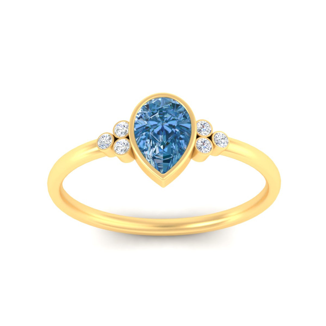 petite-bezel-set-pear-shaped-vivid-blue-engagement-ring-in-yellow-gold-fdenr9175pegvblueangle5-nl-yg.jpg