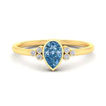 Load image into Gallery viewer, petite-bezel-set-pear-shaped-vivid-blue-engagement-ring-in-yellow-gold-fdenr9175pegvbluesleep-nl-yg.jpg