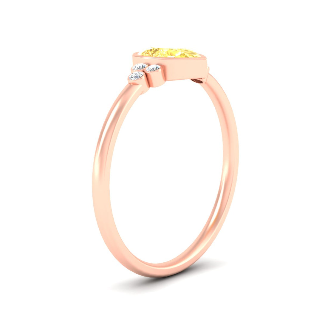 petite-bezel-set-pear-shaped-vivid-yellow-engagement-ring-in-rose-gold-fdenr9175pegvyellowangle2-nl-rg.jpg