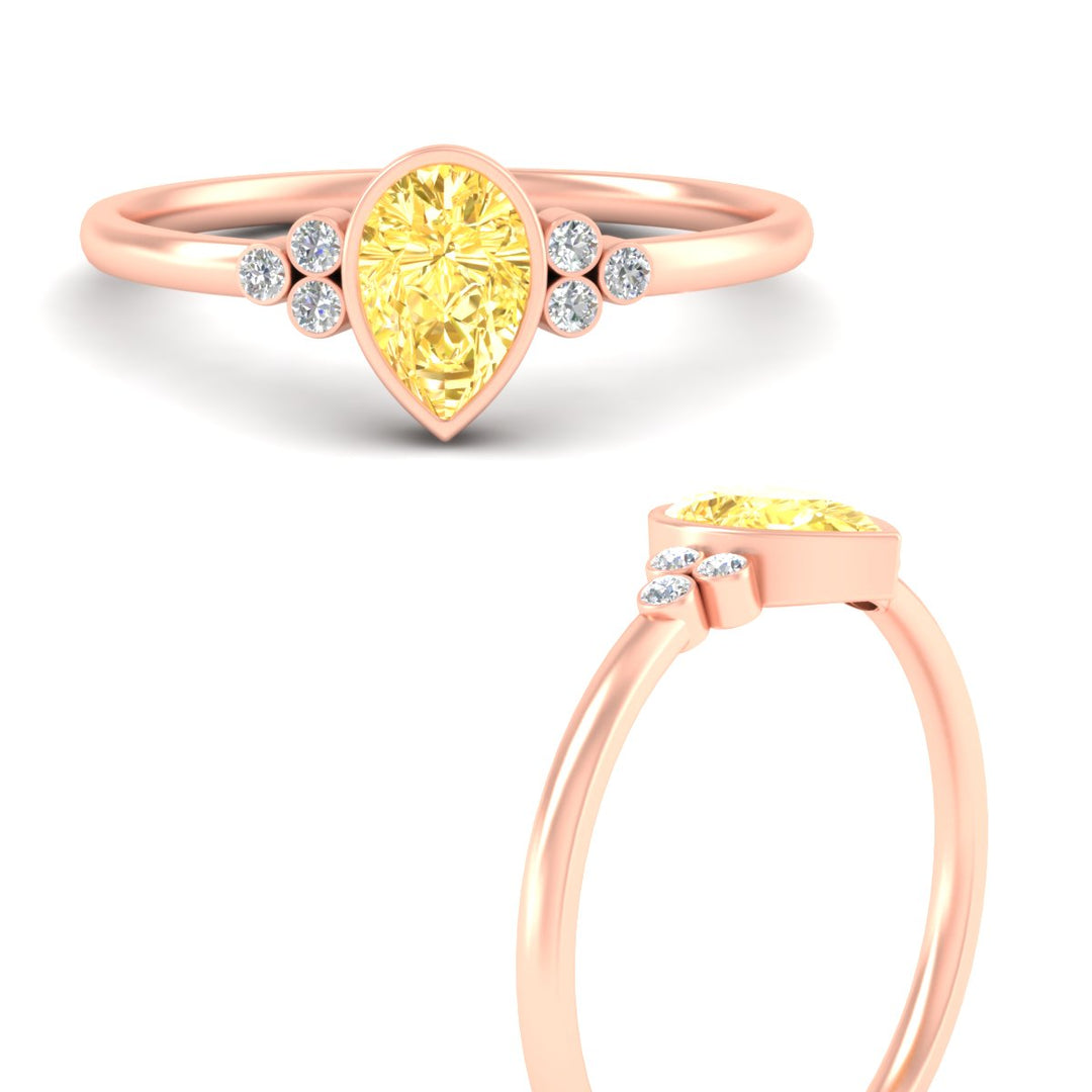 petite-bezel-set-pear-shaped-vivid-yellow-engagement-ring-in-rose-gold-fdenr9175pegvyellowangle3-nl-rg.jpg