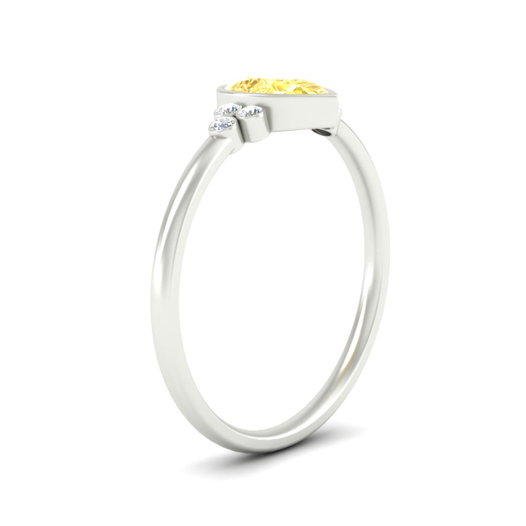 petite-bezel-set-pear-shaped-vivid-yellow-engagement-ring-in-white-gold-fdenr9175pegvyellowangle2-nl-wg.jpg
