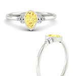 Load image into Gallery viewer, petite-bezel-set-pear-shaped-vivid-yellow-engagement-ring-in-white-gold-fdenr9175pegvyellowangle3-nl-wg.jpg