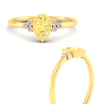 Load image into Gallery viewer, petite-bezel-set-pear-shaped-vivid-yellow-engagement-ring-in-yellow-gold-fdenr9175pegvyellowangle3-nl-yg.jpg