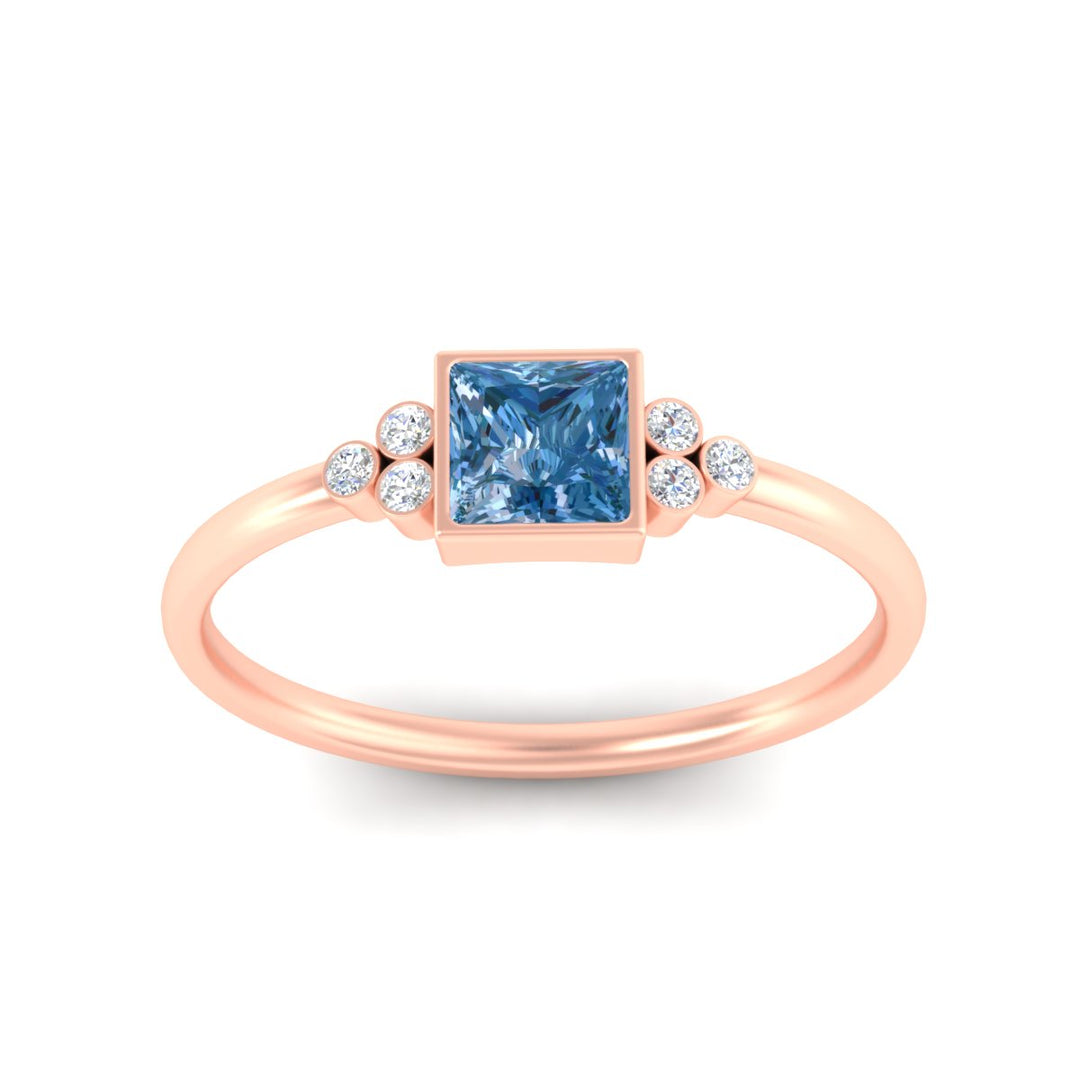 petite-bezel-set-princess-cut-vivid-blue-engagement-ring-in-rose-gold-fdenr9175prgvblueangle5-nl-rg.jpg