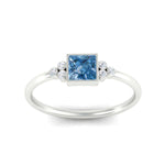Load image into Gallery viewer, petite-bezel-set-princess-cut-vivid-blue-engagement-ring-in-white-gold-fdenr9175prgvblueangle5-nl-wg.jpg
