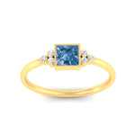 Load image into Gallery viewer, petite-bezel-set-princess-cut-vivid-blue-engagement-ring-in-yellow-gold-fdenr9175prgvblueangle5-nl-yg.jpg