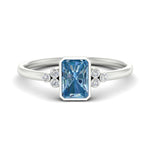 Load image into Gallery viewer, petite-bezel-set-radiant-cut-vivid-blue-engagement-ring-in-white-gold-fdenr9175ragvbluesleep-nl-wg.jpg
