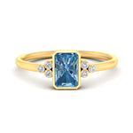 Load image into Gallery viewer, petite-bezel-set-radiant-cut-vivid-blue-engagement-ring-in-yellow-gold-fdenr9175ragvbluesleep-nl-yg.jpg