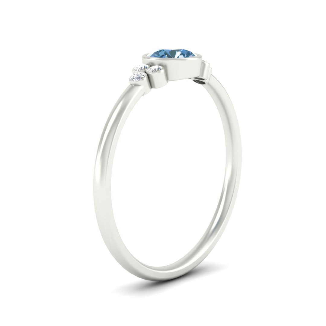 petite-bezel-set-round-cut-vivid-blue-engagement-ring-in-white-gold-fdenr9175rogvblueangle2-nl-wg.jpg