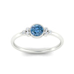 Load image into Gallery viewer, petite-bezel-set-round-cut-vivid-blue-engagement-ring-in-white-gold-fdenr9175rogvblueangle5-nl-wg.jpg