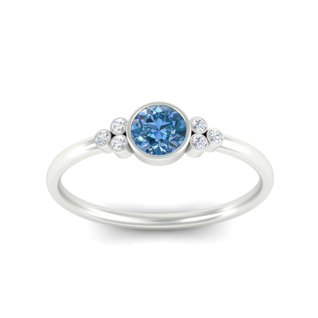 petite-bezel-set-round-cut-vivid-blue-engagement-ring-in-white-gold-fdenr9175rogvblueangle5-nl-wg.jpg