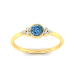 Load image into Gallery viewer, petite-bezel-set-round-cut-vivid-blue-engagement-ring-in-yellow-gold-fdenr9175rogvblueangle5-nl-yg.jpg