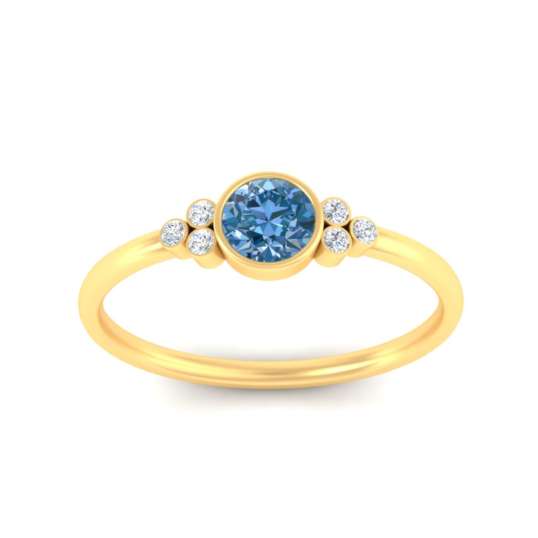 petite-bezel-set-round-cut-vivid-blue-engagement-ring-in-yellow-gold-fdenr9175rogvblueangle5-nl-yg.jpg
