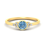 Load image into Gallery viewer, petite-bezel-set-round-cut-vivid-blue-engagement-ring-in-yellow-gold-fdenr9175rogvbluesleep-nl-yg.jpg