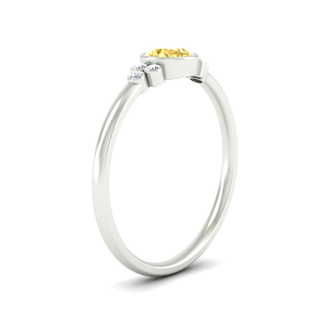 petite-bezel-set-round-cut-vivid-yellow-engagement-ring-in-white-gold-fdenr9175rogvyellowangle2-nl-wg.jpg