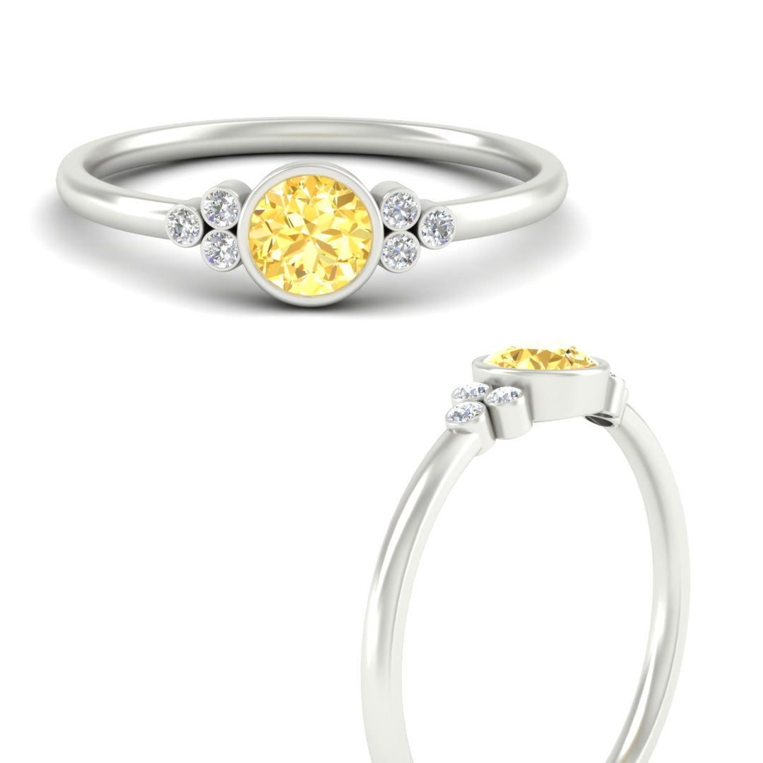petite-bezel-set-round-cut-vivid-yellow-engagement-ring-in-white-gold-fdenr9175rogvyellowangle3-nl-wg.jpg