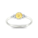 Load image into Gallery viewer, petite-bezel-set-round-cut-vivid-yellow-engagement-ring-in-white-gold-fdenr9175rogvyellowangle5-nl-wg.jpg