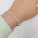 Load and play video in Gallery viewer, Four Prong Round Lab Diamond Tennis Bracelet
