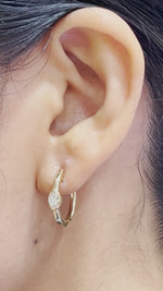 Load and play video in Gallery viewer, 0.50 Carat Lab Diamond Single Oval Bezel Huggie Earring For Women 14K Gold
