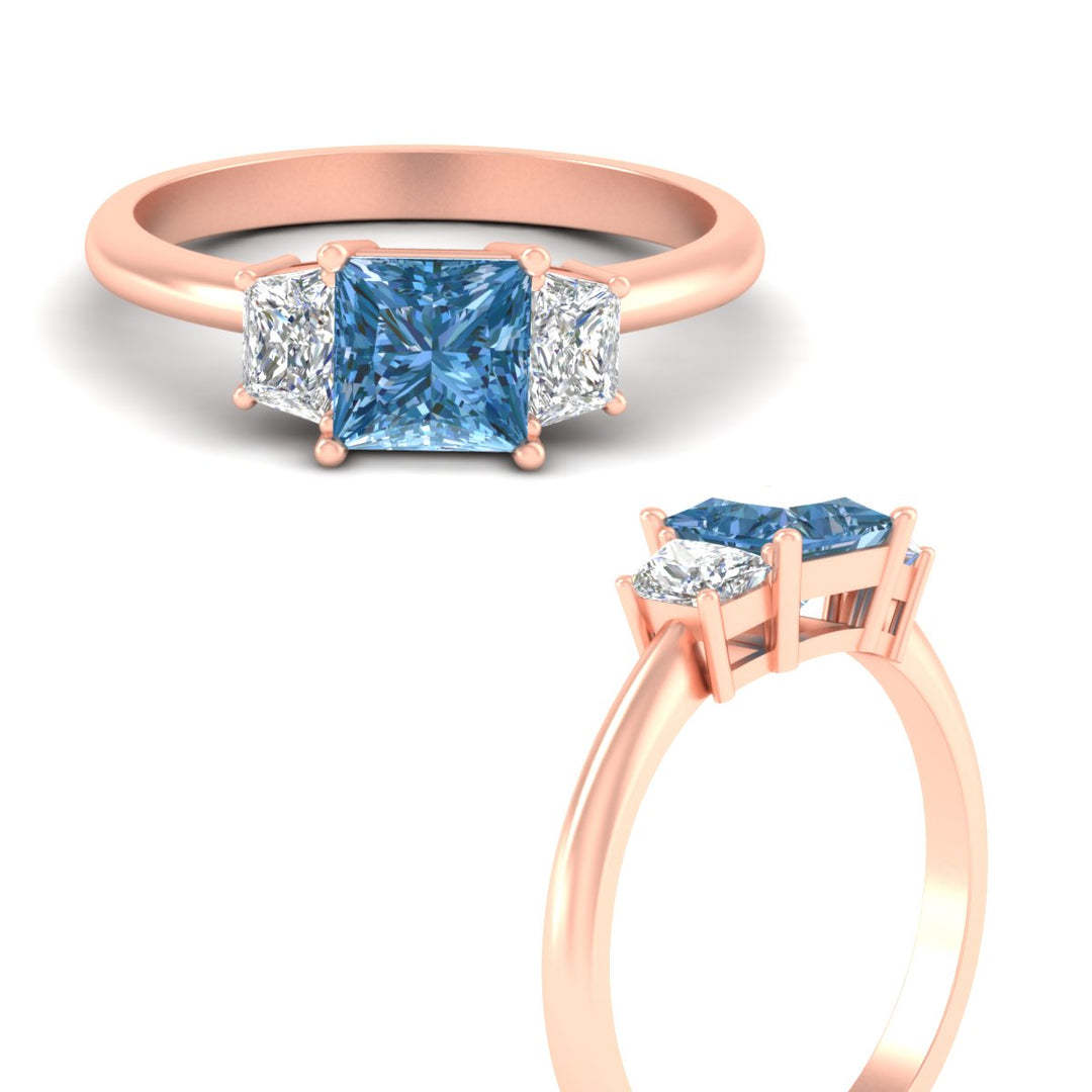 princess-cut-vivid-blue-trapezoid-engagement-ring-in-rose-gold-fdenr7981prgvblueangle3-nl-rg.jpg